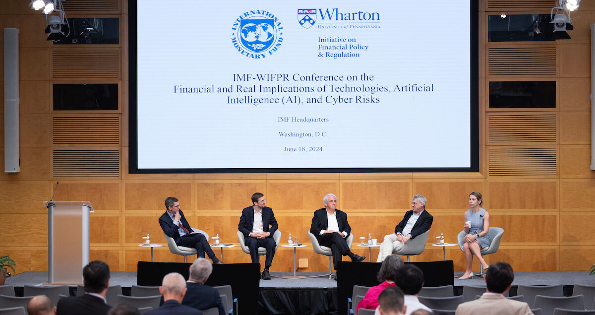 Headline panel on research, “New Technologies and Artificial Intelligence: Landscape, Challenges, and Outlook,” sits on a stage.